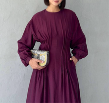 	Flowy long sleeve pleated dress in plum burgundy purple
