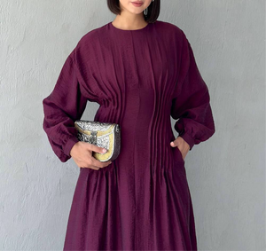 	Flowy long sleeve pleated dress in plum burgundy purple
