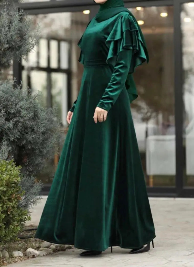 Emerald green velvet dress
